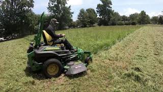 THE GREEN MONSTER RETURNS Mowing Thick Tall Grass With John Deere Z930M [upl. by Suhsoj]