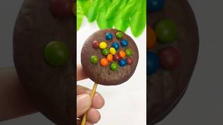 Lotte choco pie cake with small choco beans popsicle shortschocolate ytshorts [upl. by Swerdna668]