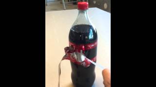 discovers the Coca Cola bottle magic trick CocaCola notice bow tie [upl. by Eitac]