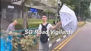 17oct2024 Jalan Kayu pedestrian walking on the road using umbrella to obstruct vehicles [upl. by Nniuqal221]