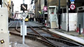 Manchester Metrolink  trams on single track in Mosley St  29 December 2015 [upl. by Hertz431]