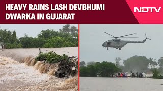 Gujarat Rain News  IAF Chopper Rescues 3 As Heavy Rains Lash Devbhumi Dwarka In Gujarat [upl. by Ataynik]