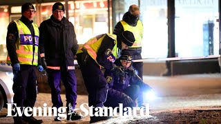 Man armed with axe injures eight in possible terrorist attack in Sweden [upl. by Suoinuj]