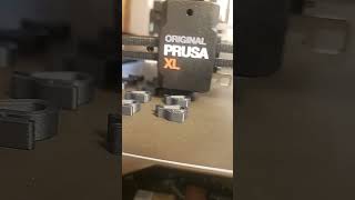 Prusa XL printing a filament clip in Prusament PC Blend Carbon Fiber Black [upl. by Ashmead708]