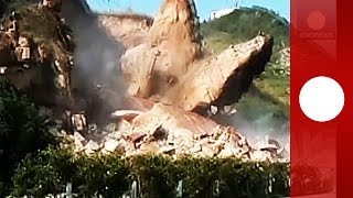 Caught on tape Huge rocks collapse fall on highway in China [upl. by Avie]