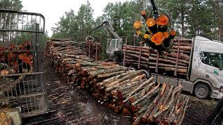 John Deere 1010G unloading firewood [upl. by Dorrehs]