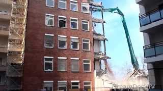 GIANT EXCAVATOR EATING LARGE BUILDING DEMOLITION CONSTRUCTION SITE [upl. by Urbanus747]