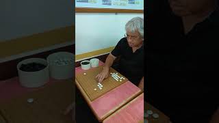 敲玉圍棋蘇老師～旋轉一色棋專注力的示範 [upl. by Lura438]