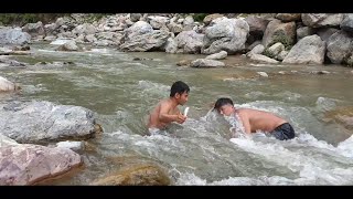 MOST PRIMITIVE FISHING METHOD IN SMALL STREAM RIVER OF NEPAL  BARE HAND FISHING  NATURAL FISHING [upl. by Ibib]