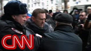 See Putin critic dragged away by Russian police [upl. by Atilol]