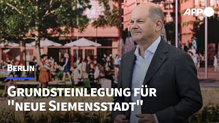 Grundsteinlegung für quotneue Siemensstadtquot in Berlin Scholz lobt quotsozialen Wohnraumquot  AFP [upl. by Cherlyn368]