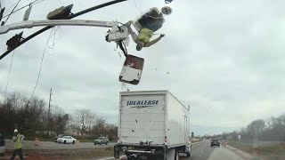 Truck crash sends worker flying out of construction bucket [upl. by Neelahs]