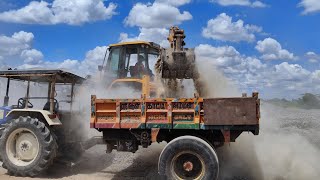 jcb 3DX backhoe loader gravel loading in swaraj 744 FEe troctor jcb video [upl. by Merrily179]