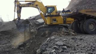 Komatsu PC2000 loading 100ton haul trucks [upl. by Cod]