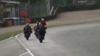 Ron Haslam wheelies past the pits at Donnington [upl. by Aiotal210]