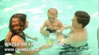 Baby Swim Lesson Underwater  Pour water on face first swimbeacom [upl. by Orabelle]