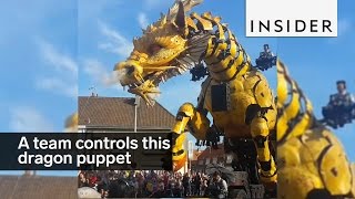 It takes a team to man this giant mechanical dragon puppet [upl. by Ursala137]