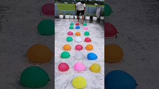 The balloon man jumps onto water balloons randomlyfunny race trending balloon challenge sports [upl. by Fried280]