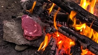 Primitive Bushcraft  Cooking Meat on a Rock  Self Reliance [upl. by Reld]