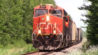 ET44AC 3034 Leads a Short Freight Train CN 594 West towards River Glade NB at Track Speed [upl. by Ainwat]