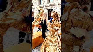 London Levitating Goldman Statue getting kisses from random ladiesfloating art works [upl. by Lemrahs559]