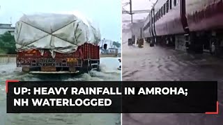 UP Heavy rainfall in Amroha waterlogging in several areas vehicular movement affected [upl. by Pytlik359]