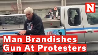 Watch Man Brandishes Gun At Protesters And Yells Get Away From Me During Oregon Incident [upl. by Pigeon482]