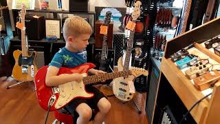 4 year old kid in guitar store getting his 1st taste of heavy metal [upl. by Decima350]