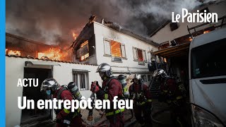 Aubervilliers  un spectaculaire incendie ravage un entrepôt [upl. by Daye671]