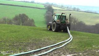 Muck 12 Pumping Prep for New Field John Deere action [upl. by Anaihr641]