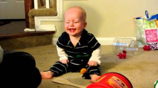 Baby thinks vomiting sock is hilarious [upl. by Nednil973]