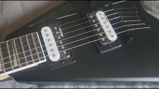 Unboxing Jackson JS32T Randy Rhoads V Electric Guitar [upl. by Ellynad]