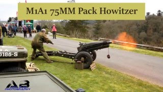 M1A1 75mm Pack Howitzer Firing  WW2 Artillery [upl. by Yltsew]