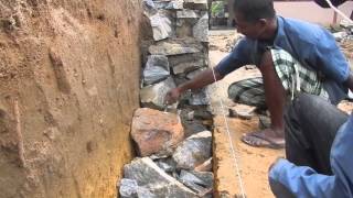 Sri Lankaශ්‍රී ලංකාCeylon Stonemason Rock Wall buildingwell doneStonemasonry [upl. by Ardnaeed]