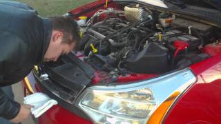 How to Change the Headlights on a 2008 US Model Ford Focus [upl. by Adiela278]