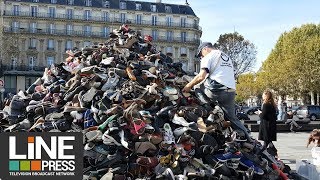 Pyramide de chaussures dHandicap International  Paris  France 29 septembre 2018 [upl. by Retloc49]