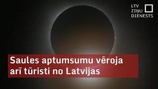 Saules aptumsumu vēroja arī tūristi no Latvijas [upl. by Eyatnod]