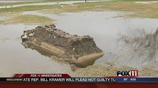 Manitowoc grave erupts due to flooding [upl. by Dadinirt]