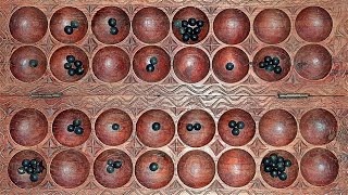 How to play omwesoigisoro African mancala game [upl. by Forlini]