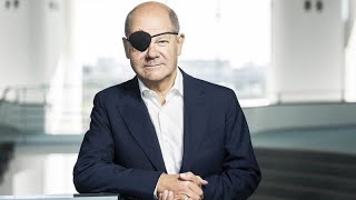 Scholz quotil pirataquot il cancelliere tedesco sfoggia una benda sullocchio dopo unincidente [upl. by Ariom]