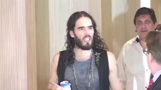 Russell Brand Cancels Middle East Messiah Tour Gigs  Splash News  Splash News TV  Splash News TV [upl. by Nort]