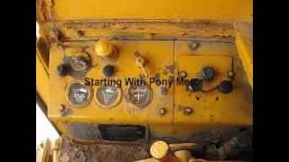 Starting 1950s Caterpillar 112 Motor Grader [upl. by Gnep]