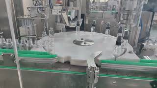 Liquiddisinfectantperfume filling capping machine [upl. by Truk369]