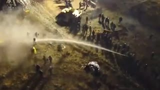 Police Use Water Cannon on Dakota Pipeline Protesters Drone Footage [upl. by Bina]