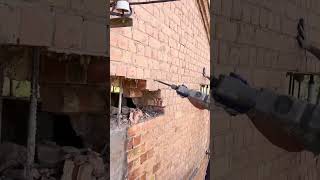 Loadbearing wall dismantling process with an electric pick for the brick house [upl. by Linson]