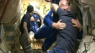 Hugging it out US and Russian astronauts get along in space [upl. by Mishaan22]