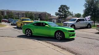 Cars leaving Lincoln Southwest High School in Lincoln Nebraska on the 2023 Mr Rod Memorial Cruise [upl. by Yramesor]