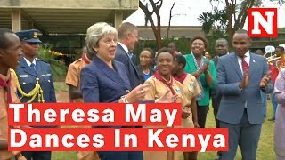 Theresa May Dances Awkwardly In Kenya [upl. by Ynamad527]