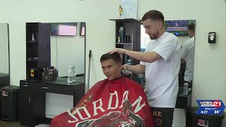 New Sisters barber shop already giving back [upl. by Ateinotna962]