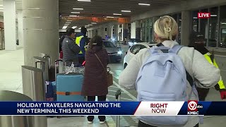 Holiday travelers navigating new airport terminal at KCI [upl. by Kane]